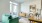 living area that includes ample seating spaces and bright lighting
