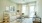 living area that includes ample seating spaces and bright lighting
