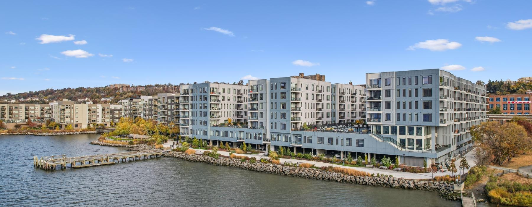a body of water with buildings along it
