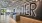 a large room with a sign on the wall
